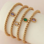 Bracelet doré avec pierre de naissance pour femme