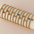 Bracelet doré avec pierre de naissance pour femme janvier