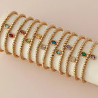 Pulsera dorada con piedra de nacimiento para mujer 