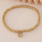 Pulsera dorada con piedra de nacimiento para mujer 