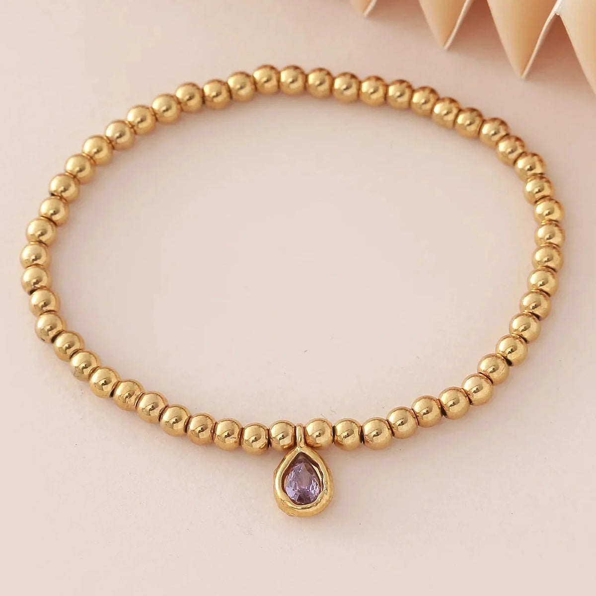 Pulsera dorada con piedra de nacimiento para mujer 