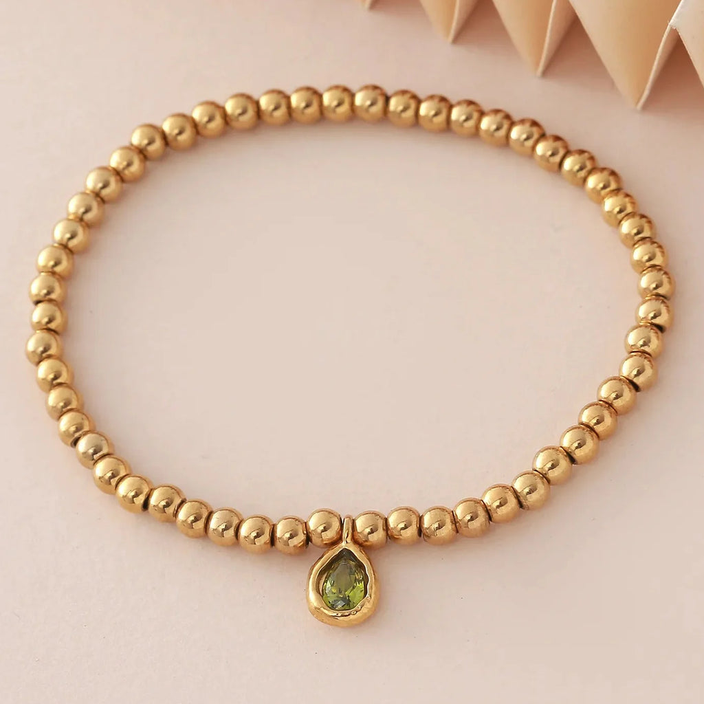 Pulsera dorada con piedra de nacimiento para mujer 