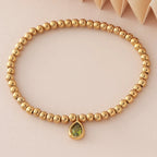 Pulsera dorada con piedra de nacimiento para mujer 