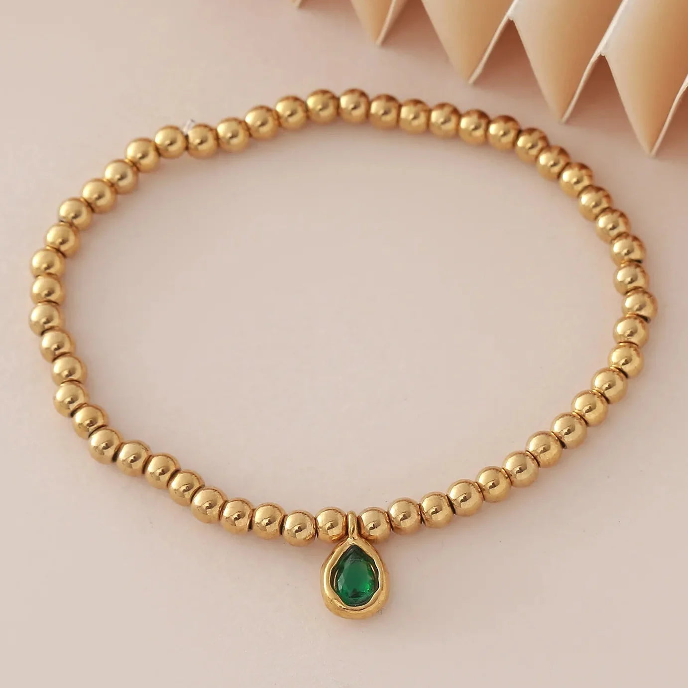 Bracelet doré avec pierre de naissance pour femme