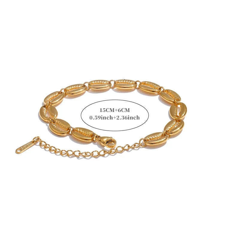 Bracelet doré coquillage cauri