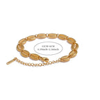 Bracelet doré coquillage cauri