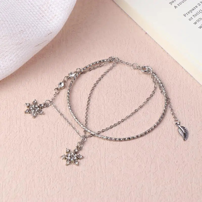 Pulsera Doble con Copos de Nieve de Cristal