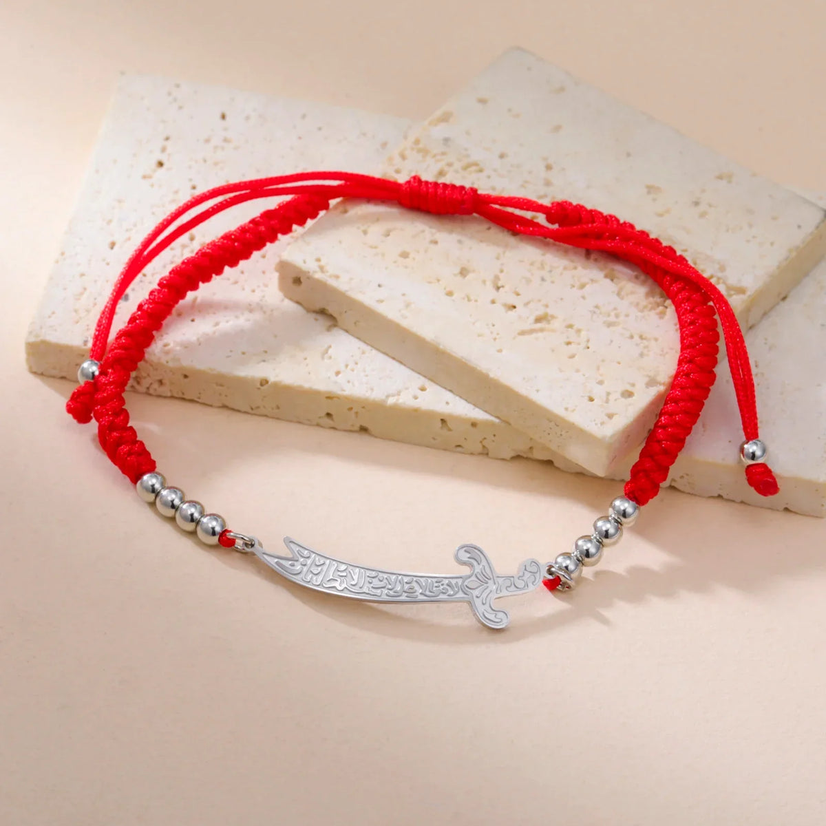 Rope bracelet with Ali Zulfiqar sword, an Islamic symbol 