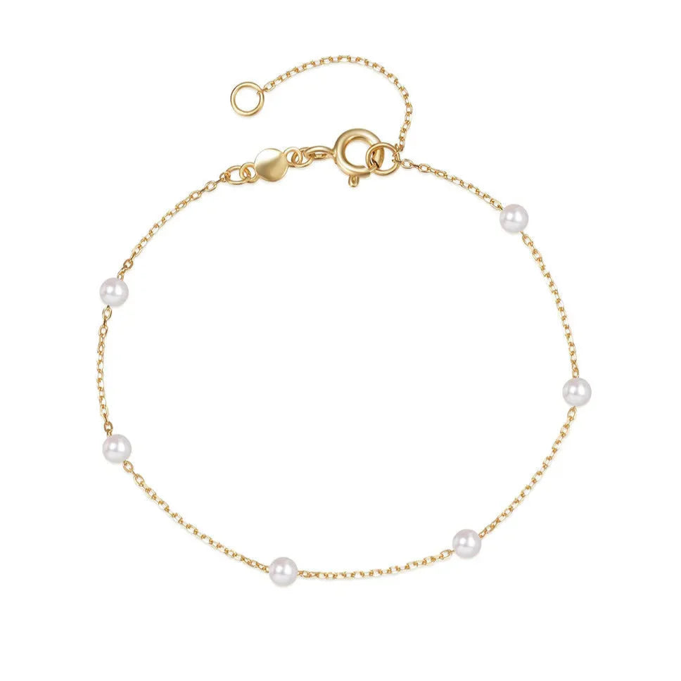 Pulsera de cadena fina con perlas blancas
