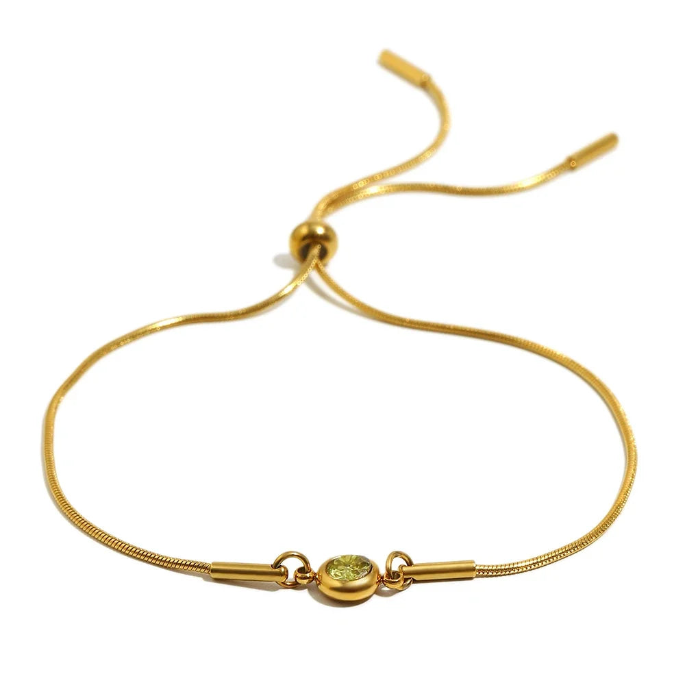 Birthstone bangle bracelet with colored stone