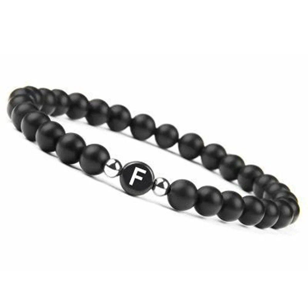 Bracelet noir initiale f