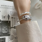 Bracelet plume argenté pour femme