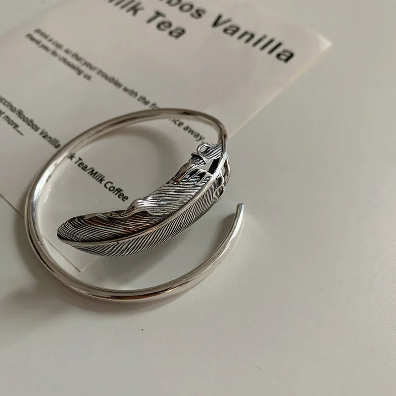 Bracelet plume argenté pour femme