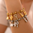 Women's bracelet with keys and padlock
