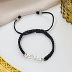 Braided Bracelet with Black and Silver Mountain Pendant