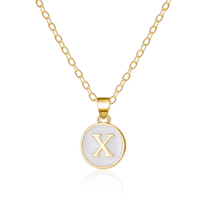 Collier avec pendentif blanc initiale x