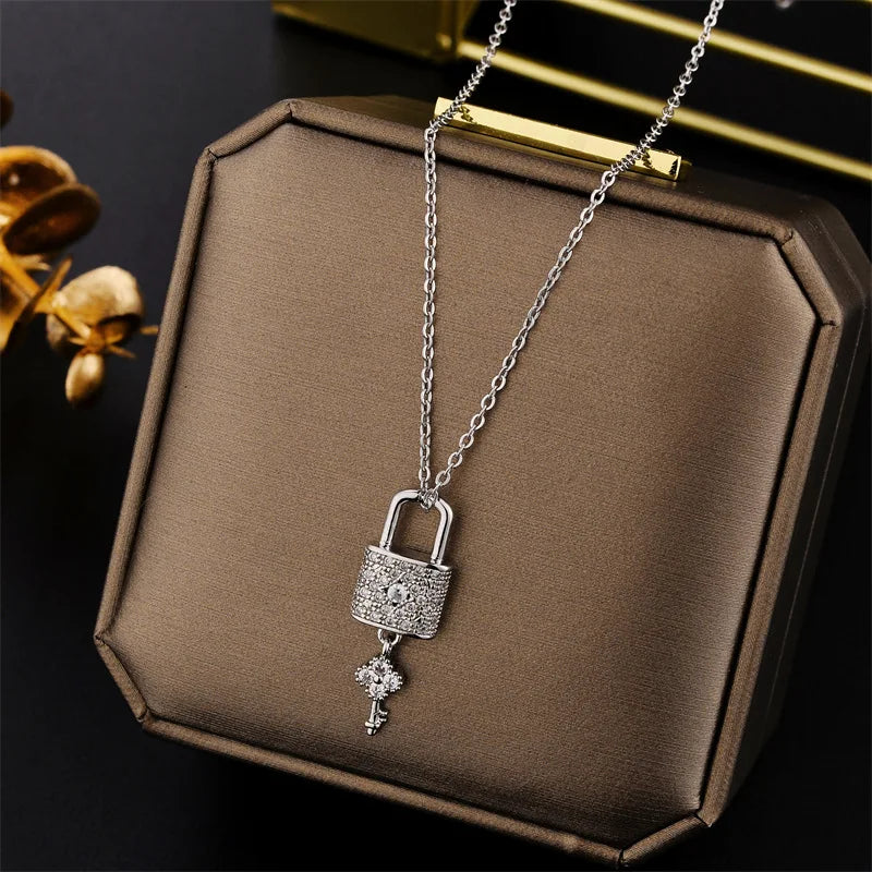 Necklace with key and lock pendant