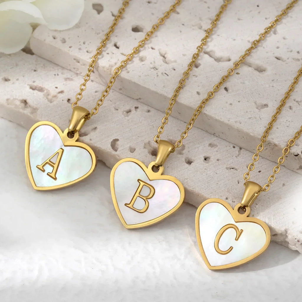 Necklace with white heart initial letter pendant