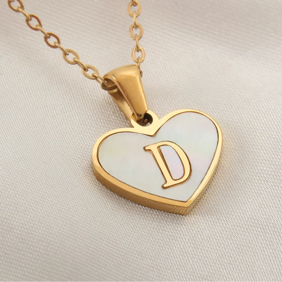 Necklace with white heart initial letter pendant