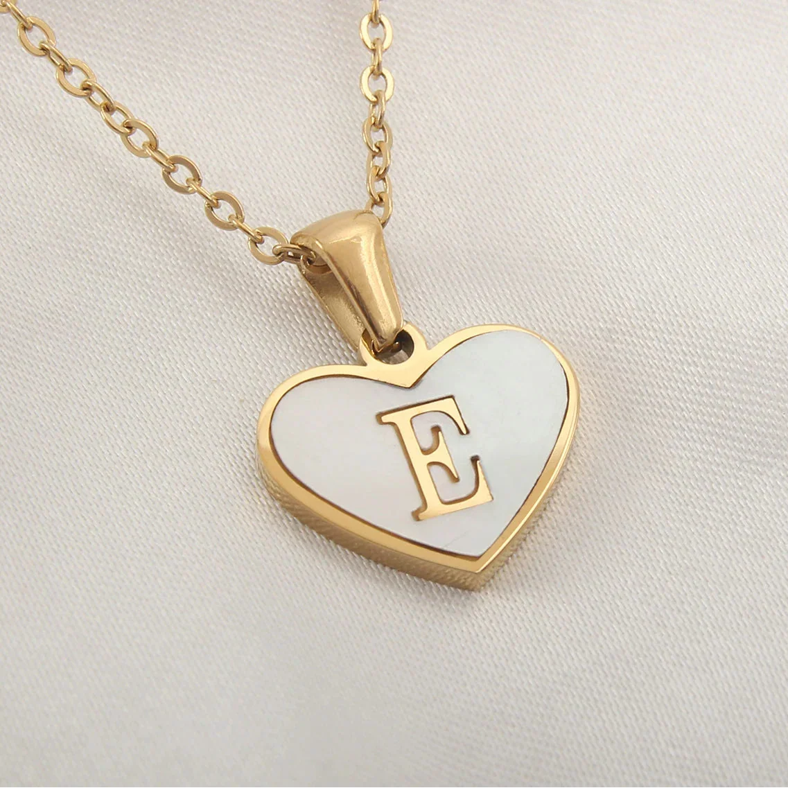 Necklace with white heart initial letter pendant