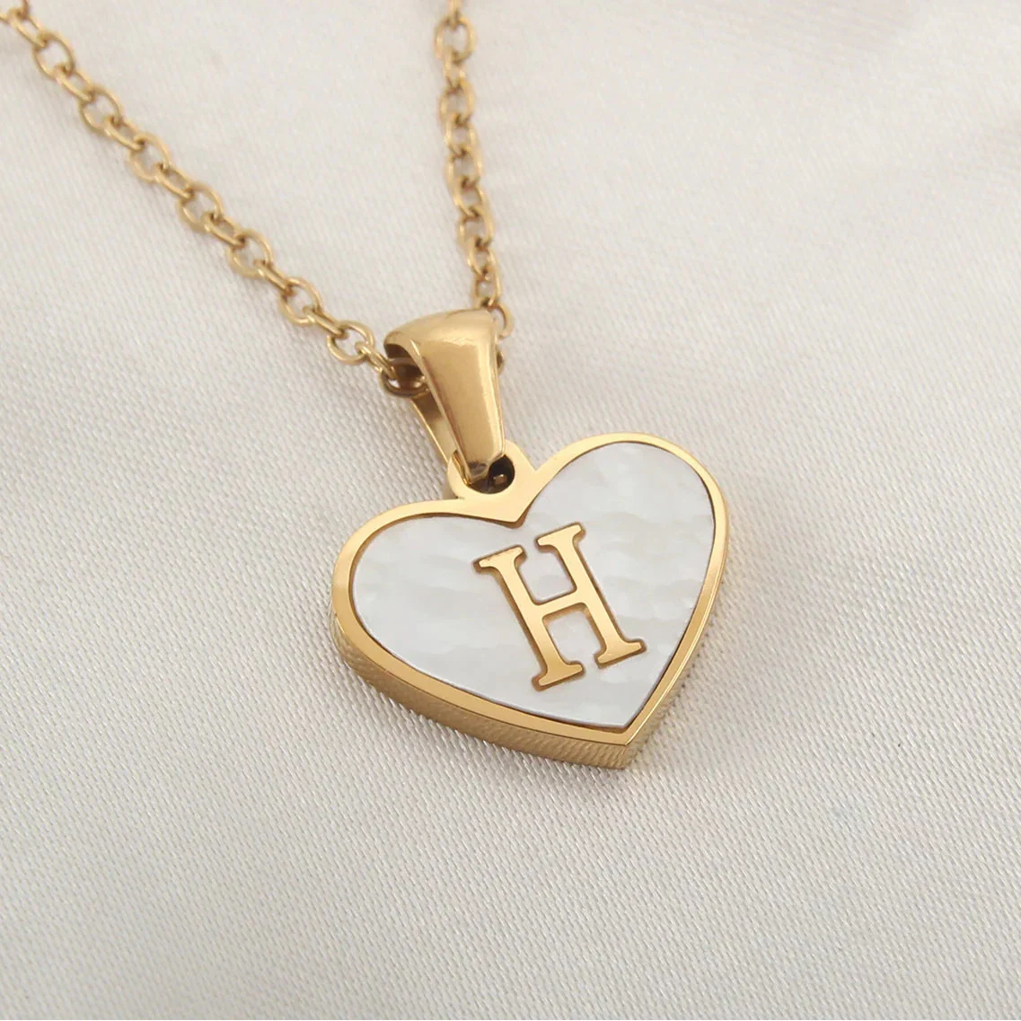 Necklace with white heart initial letter pendant