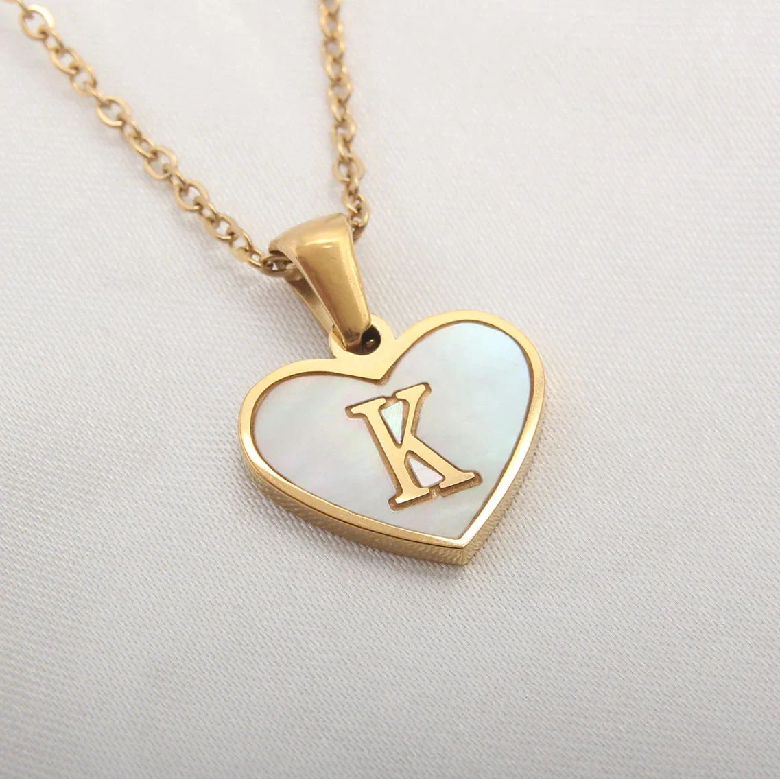 Necklace with white heart initial letter pendant