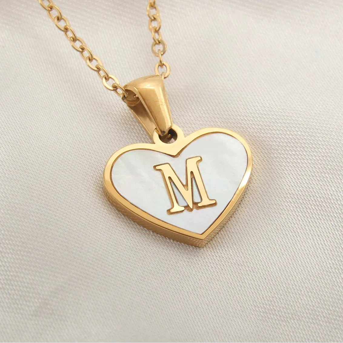 Necklace with white heart initial letter pendant