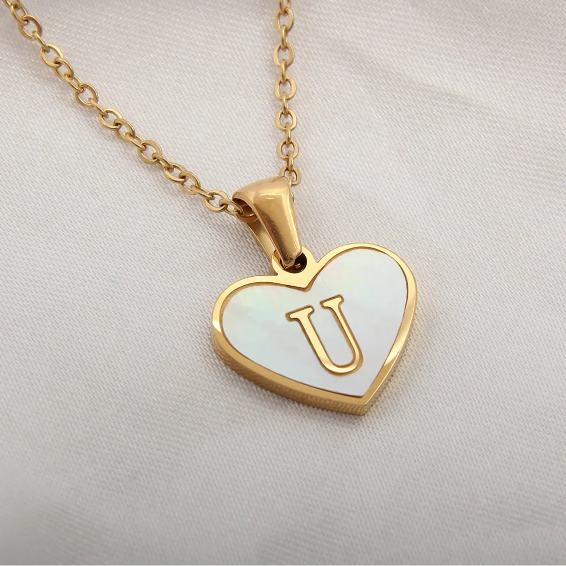 Necklace with white heart initial letter pendant