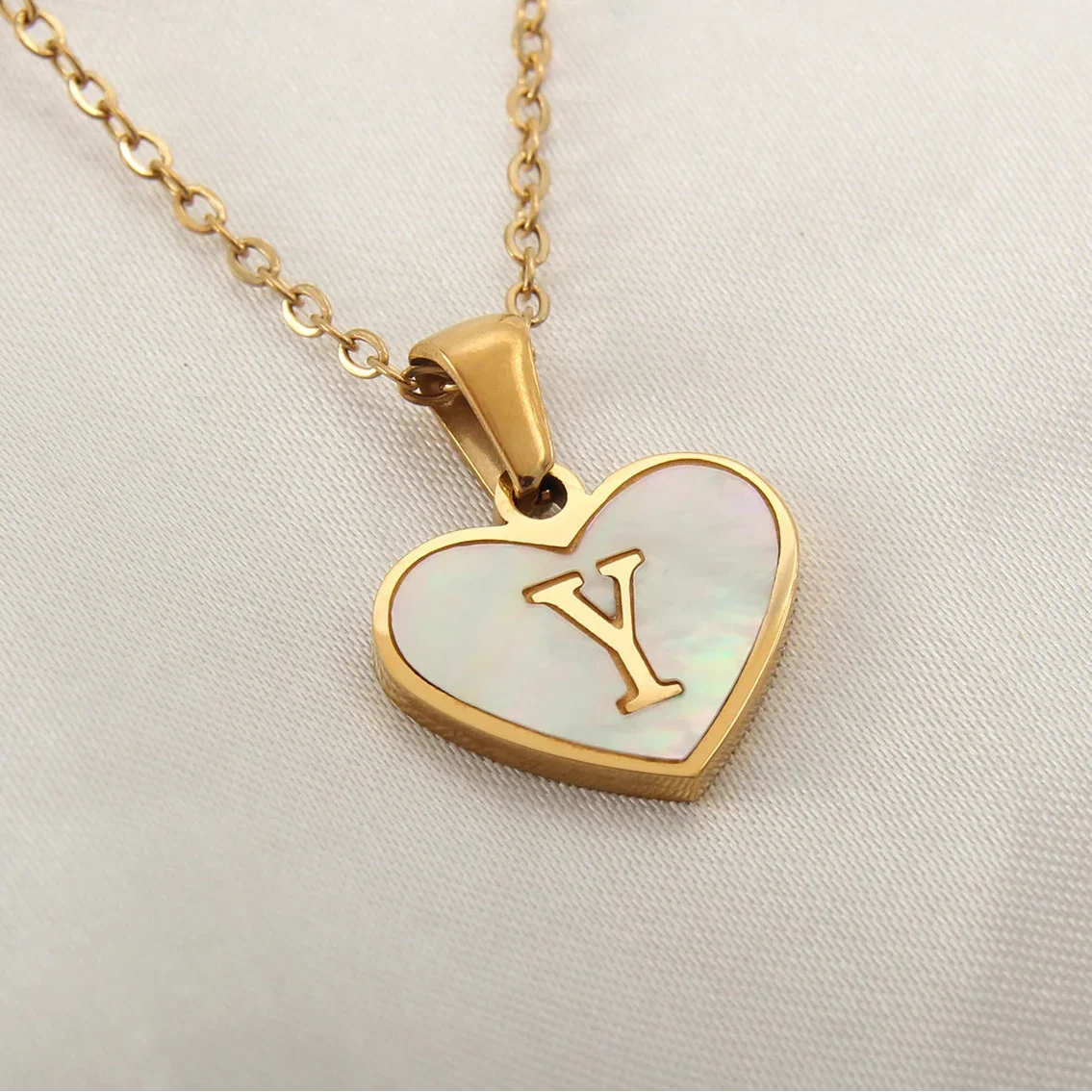 Necklace with white heart initial letter pendant