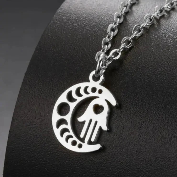 Collar con colgante de media luna y mano de Fátima árabe 