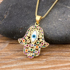 Collier avec pendentif de protection contre le mauvais œil et main de Fatma multicolore