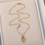 Collier avec pendentif de protection contre le mauvais œil et main de Fatma multicolore arabe