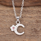 Necklace with flower pendant and initial letter