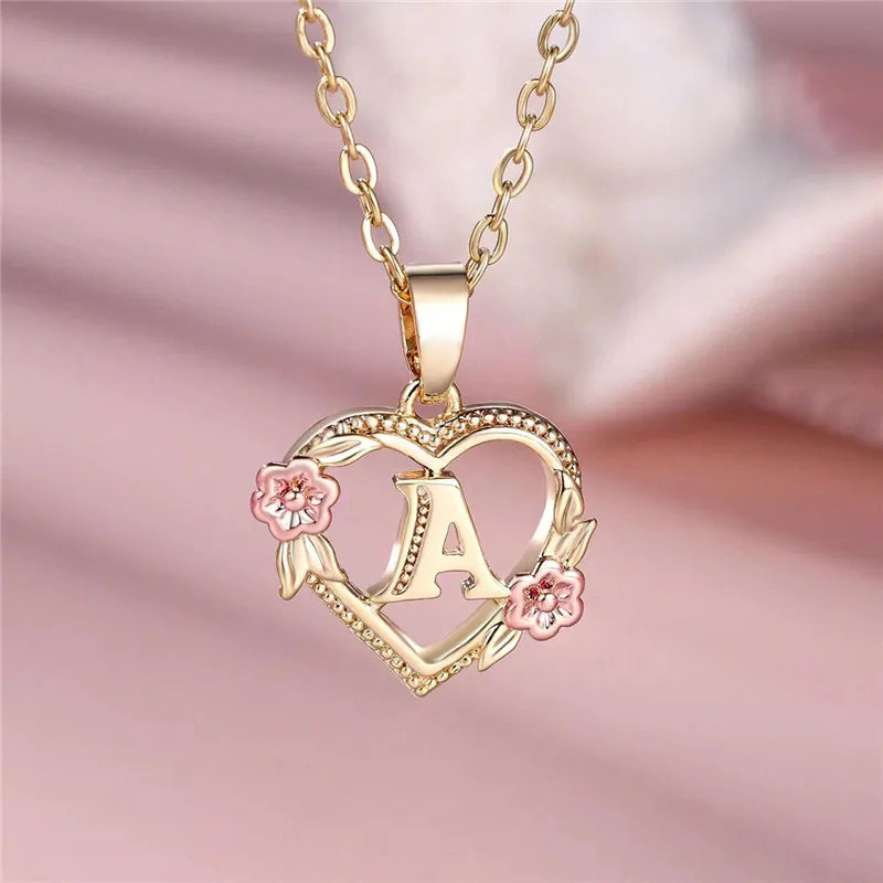 Necklace with heart and flower initial letter pendant
