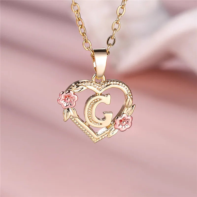 Necklace with heart and flower initial letter pendant