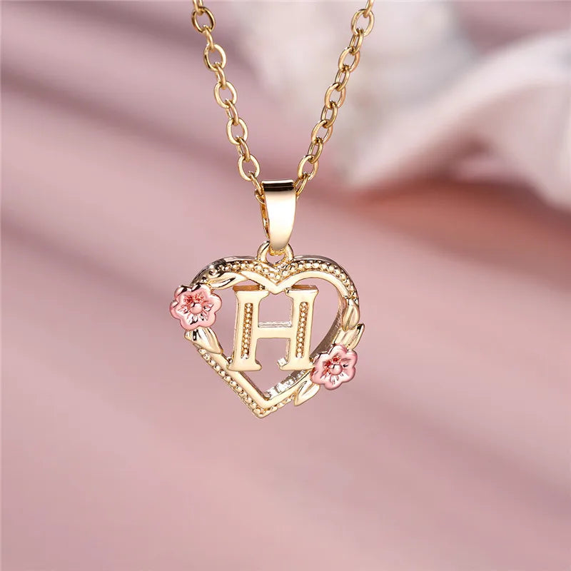 Necklace with heart and flower initial letter pendant