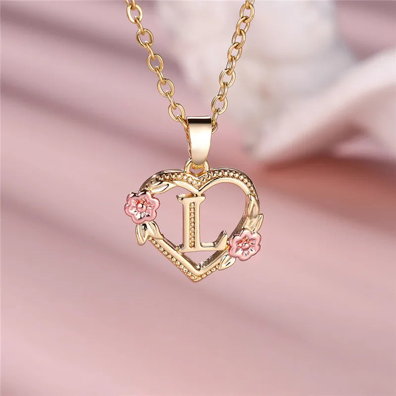 Necklace with heart and flower initial letter pendant