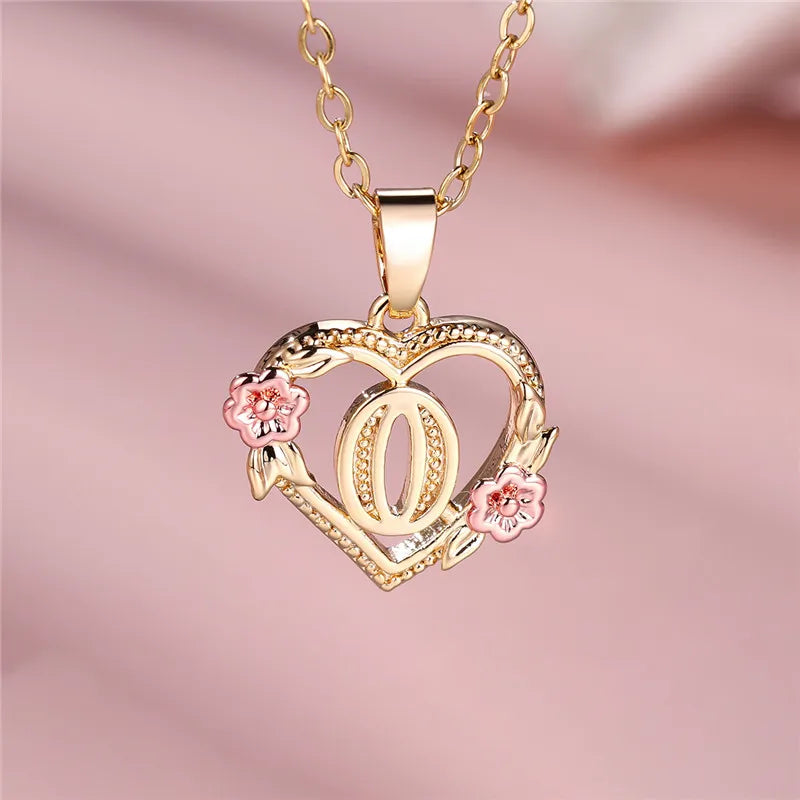 Necklace with heart and flower initial letter pendant