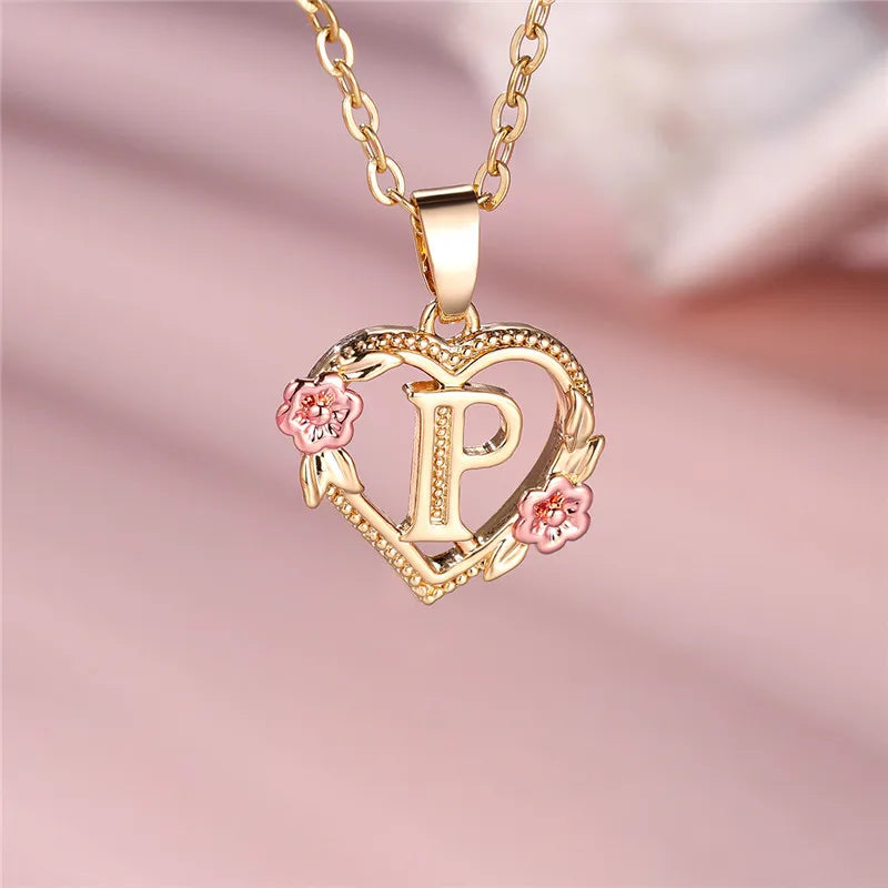 Necklace with heart and flower initial letter pendant