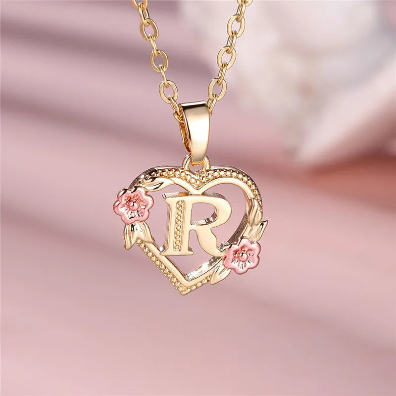 Necklace with heart and flower initial letter pendant