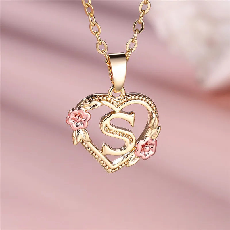 Necklace with heart and flower initial letter pendant