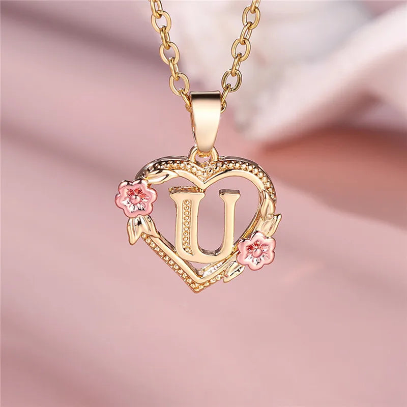 Necklace with heart and flower initial letter pendant