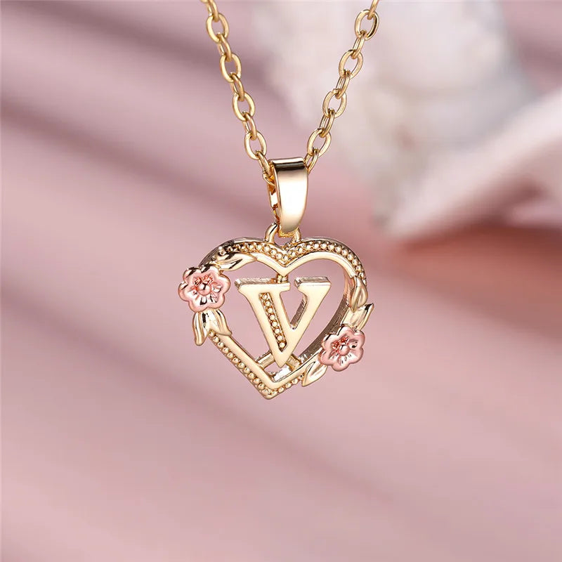 Necklace with heart and flower initial letter pendant