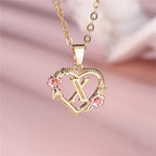 Necklace with heart and flower initial letter pendant