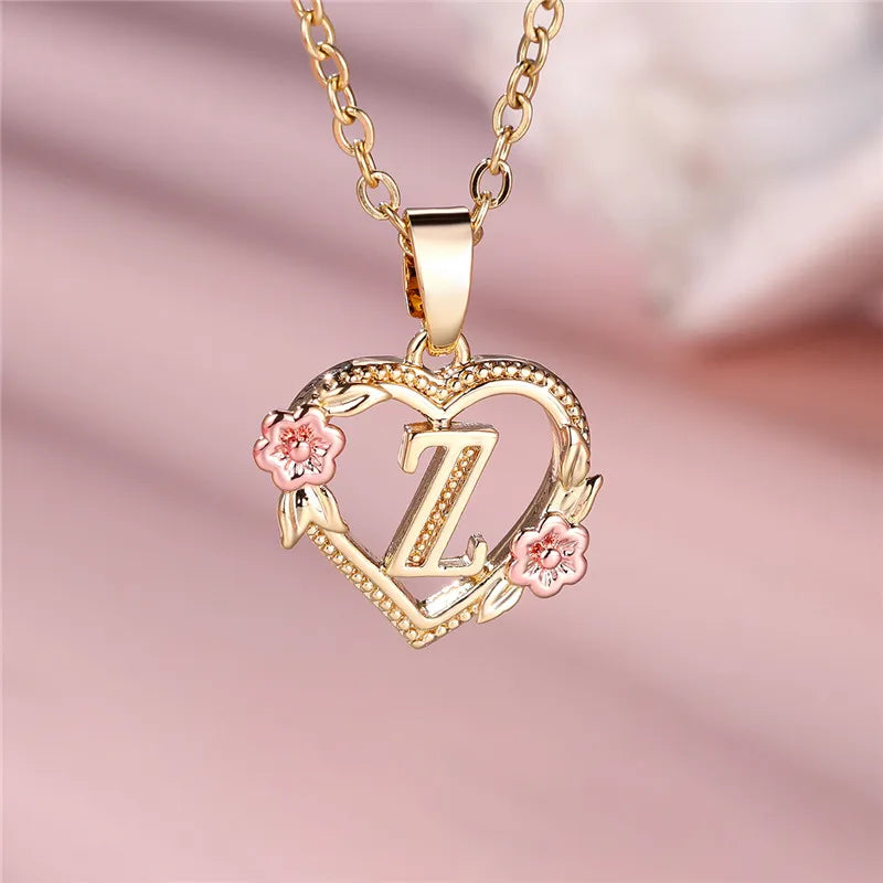 Necklace with heart and flower initial letter pendant