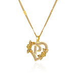 Collier avec pendentif initiale et coeur p