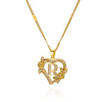 Collier avec pendentif initiale et coeur r