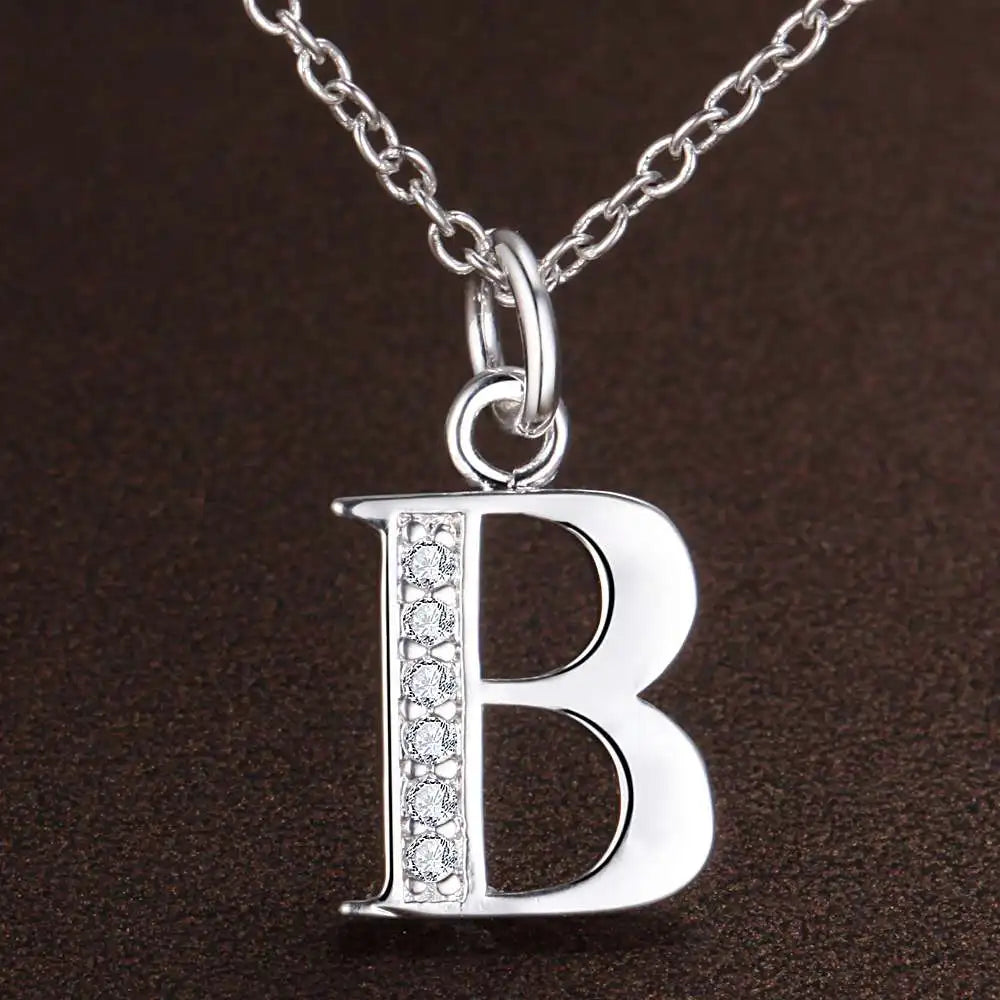 Necklace with initial letter pendant and rhinestones