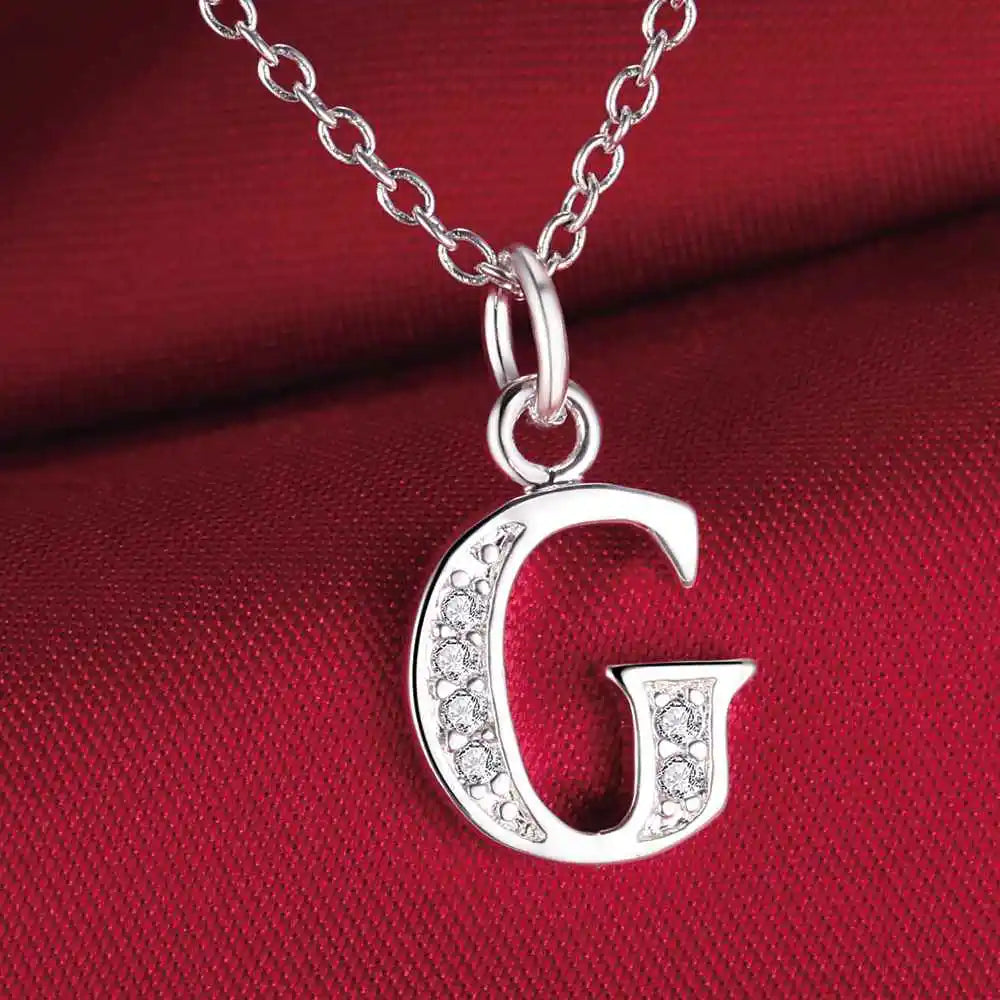 Necklace with initial letter pendant and rhinestones