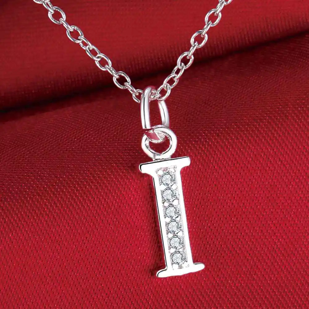 Necklace with initial letter pendant and rhinestones